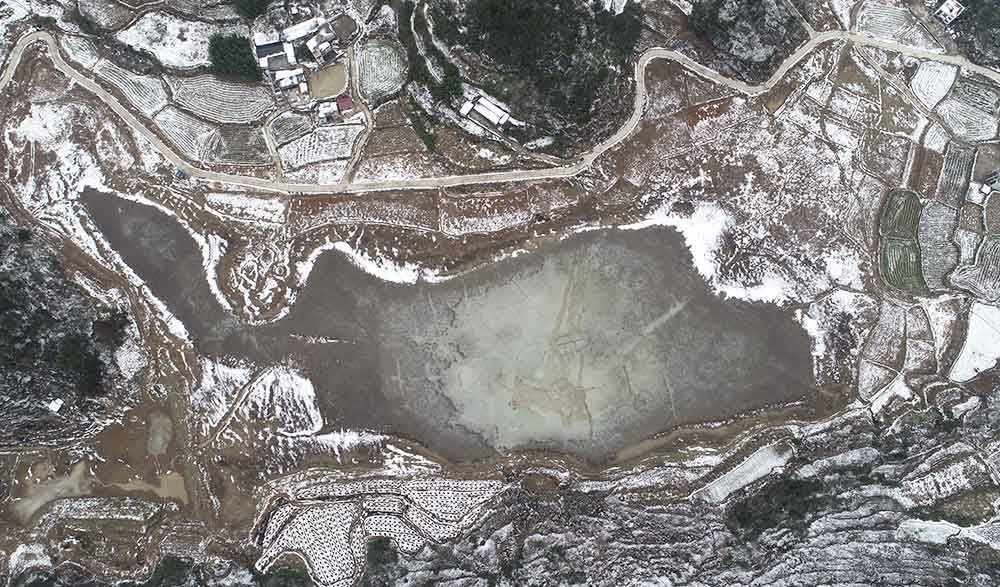 松桃：雪地捕鱼　迎新年